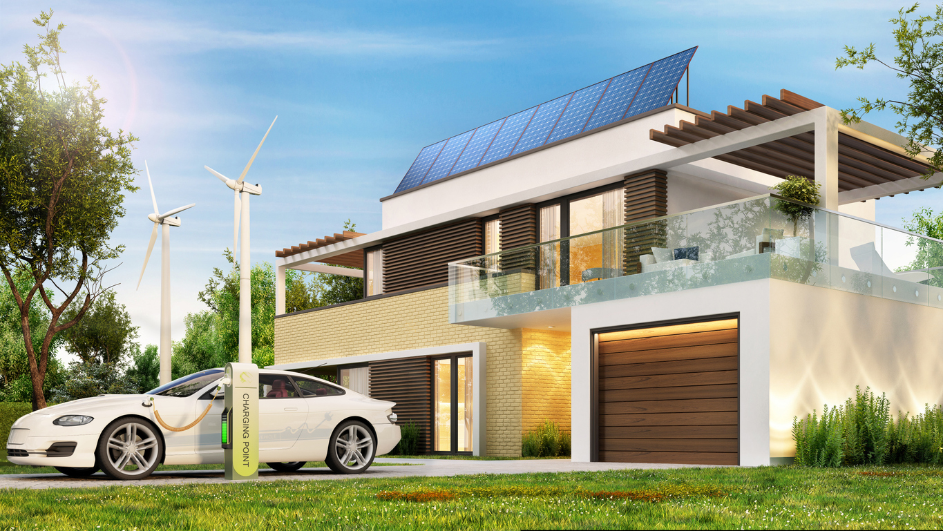 Modern home with solar panels, wind turbines and electric car